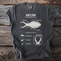 Dark grey t-shirt graphic detailing an antlion, its features, and behaviors.