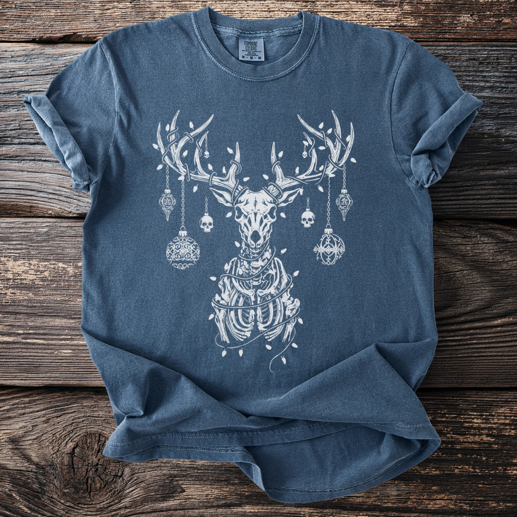 Blue t-shirt with white print of a skeletal deer with ornaments and lights.