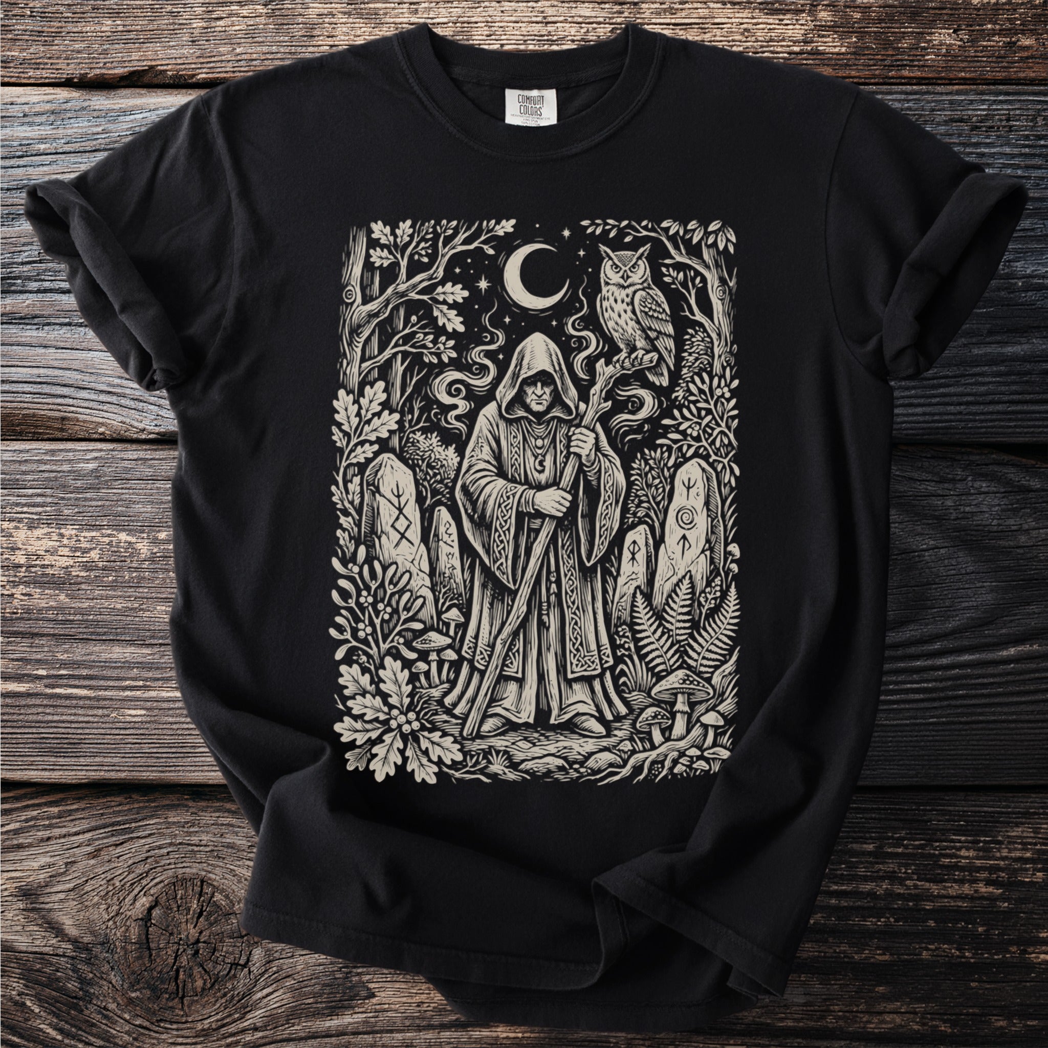 Wizard in a hooded robe standing amongst ancient stones and forest flora under a crescent moon.