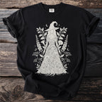 Black t-shirt with a line art design of a witch surrounded by foliage and celestial elements.