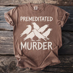 Brown t-shirt with white text reading "PREMEDITATED MURDER" and five white crow silhouettes.