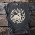 T-shirt with a rabbit, antlers, thorny vines, and Norse runes design.