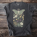 Dark grey t-shirt with a green luna moth and floral design, and a moon crescent.