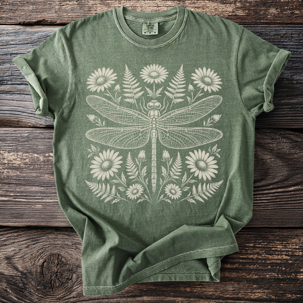 Green t-shirt with cream dragonfly and floral design.