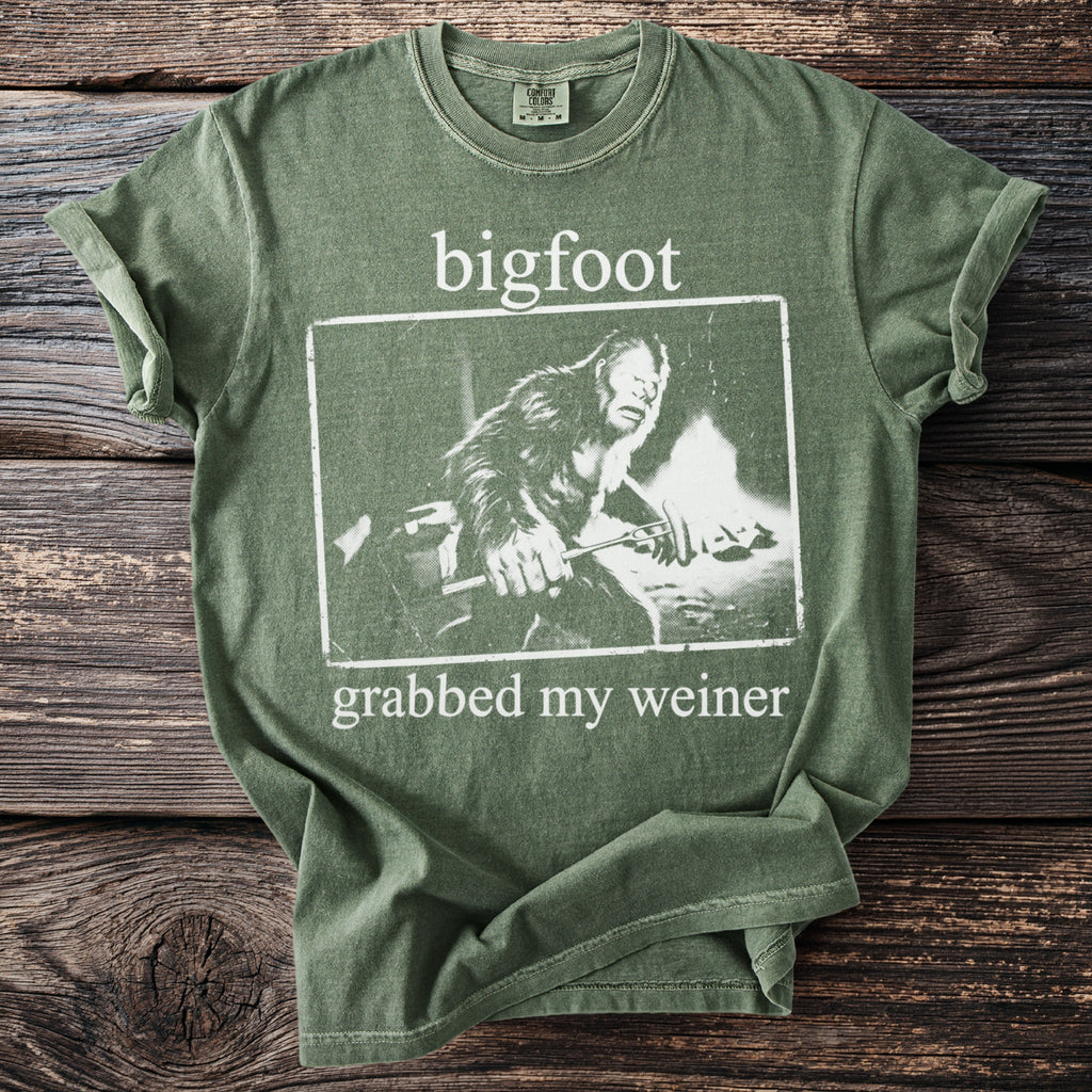 Green t-shirt with Bigfoot design and text "bigfoot grabbed my weiner".