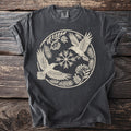 Dark gray t-shirt with circular raven and snowflake graphic design.