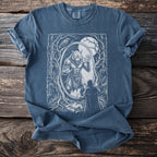 Werewolf reflection in a mirror in a forest, with a cloaked figure watching.