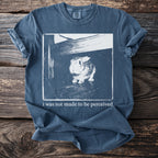 Blue t-shirt with a white graphic of a rabbit and the text "i was not made to be perceived."