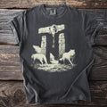 Dark gray t-shirt with three wolves beneath a stone arch carrying a ram skull and runic inscriptions.
