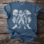 Blue t-shirt with drawing of a werewolf, wolf head, skull, hands, and feet.