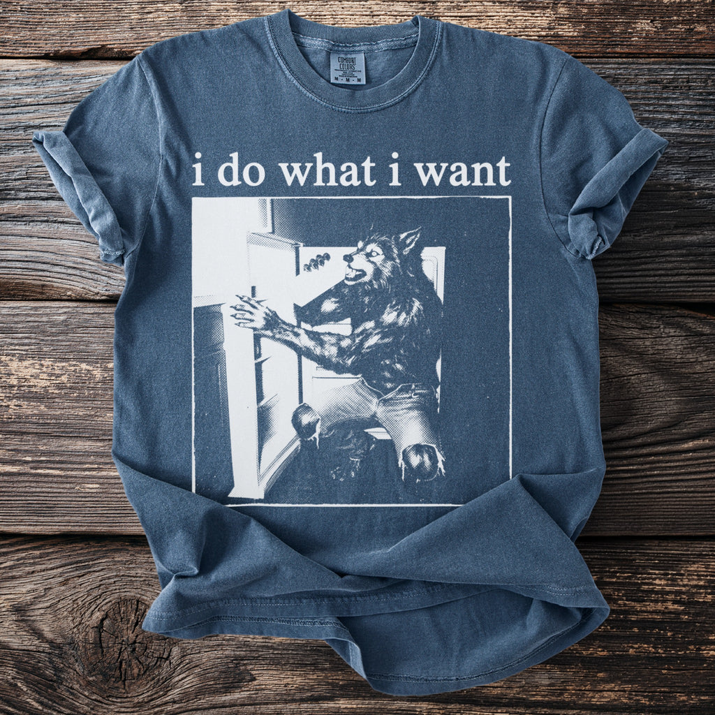 Blue t-shirt with "i do what i want" and werewolf at a refrigerator graphic.