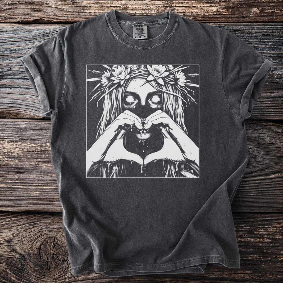 T-shirt with a black and white illustration of a woman with a flower crown and heart hands.