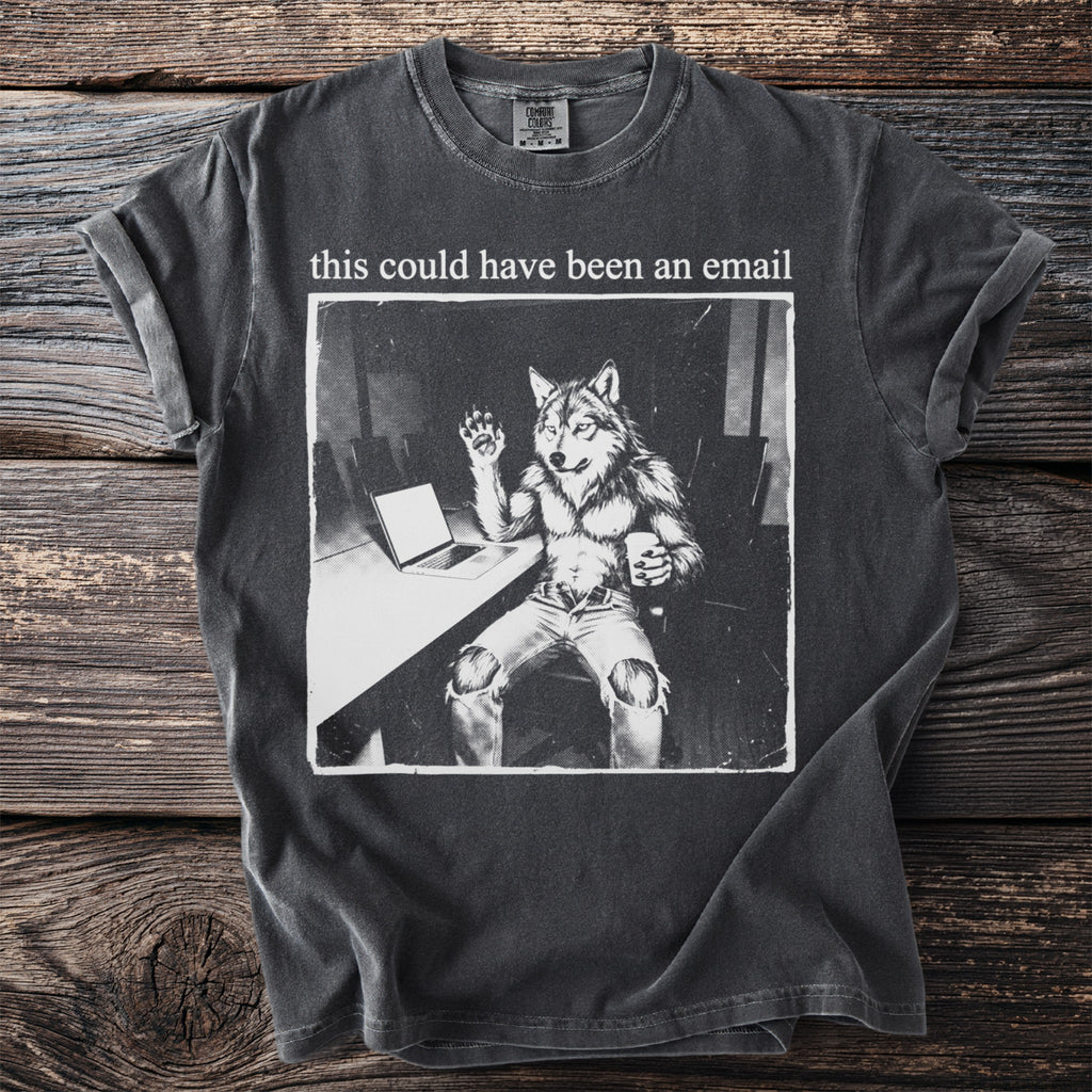 Shirt with wolfman at desk and text that could have been an email.