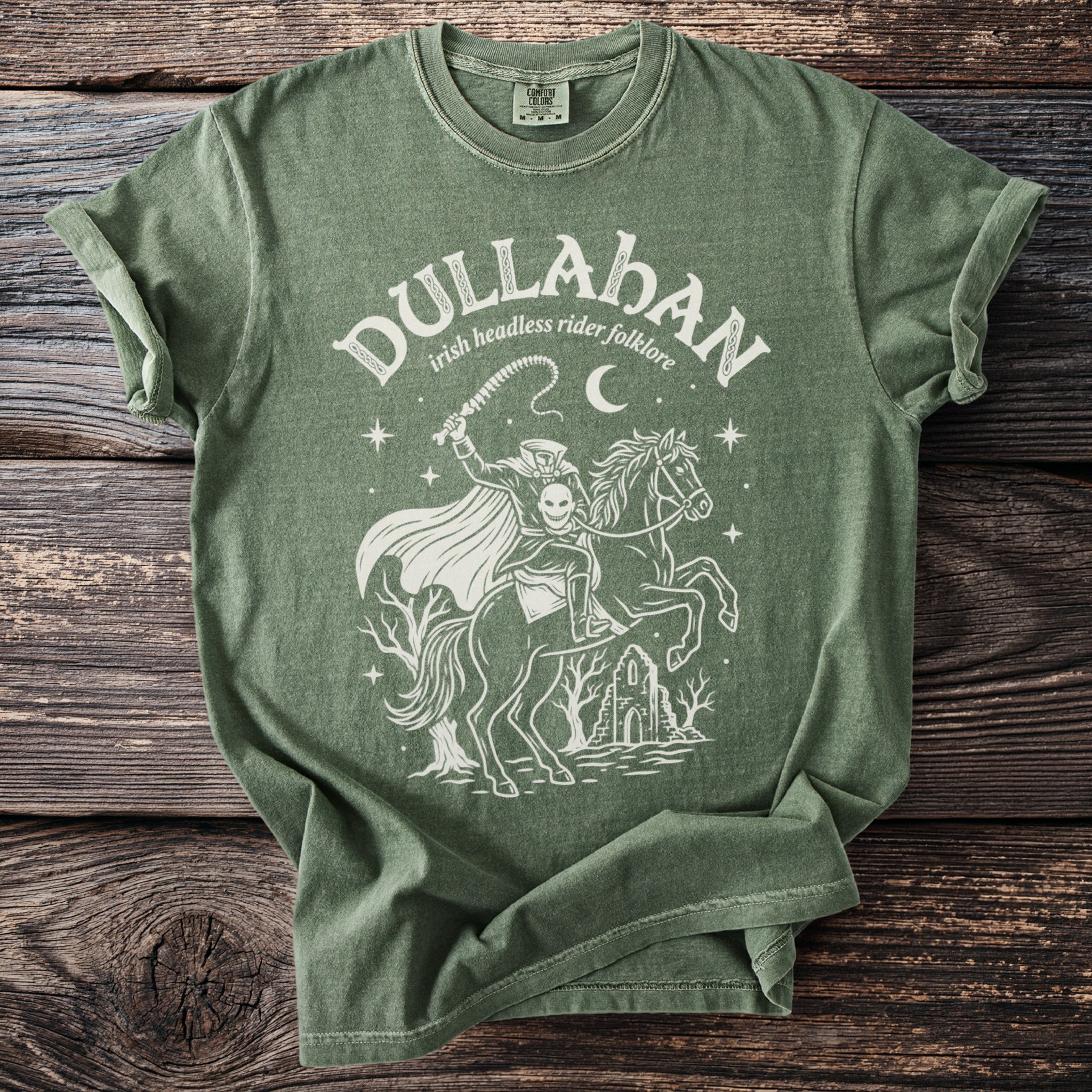 Dullahan Irish Headless Rider Folklore graphic tee on green shirt.