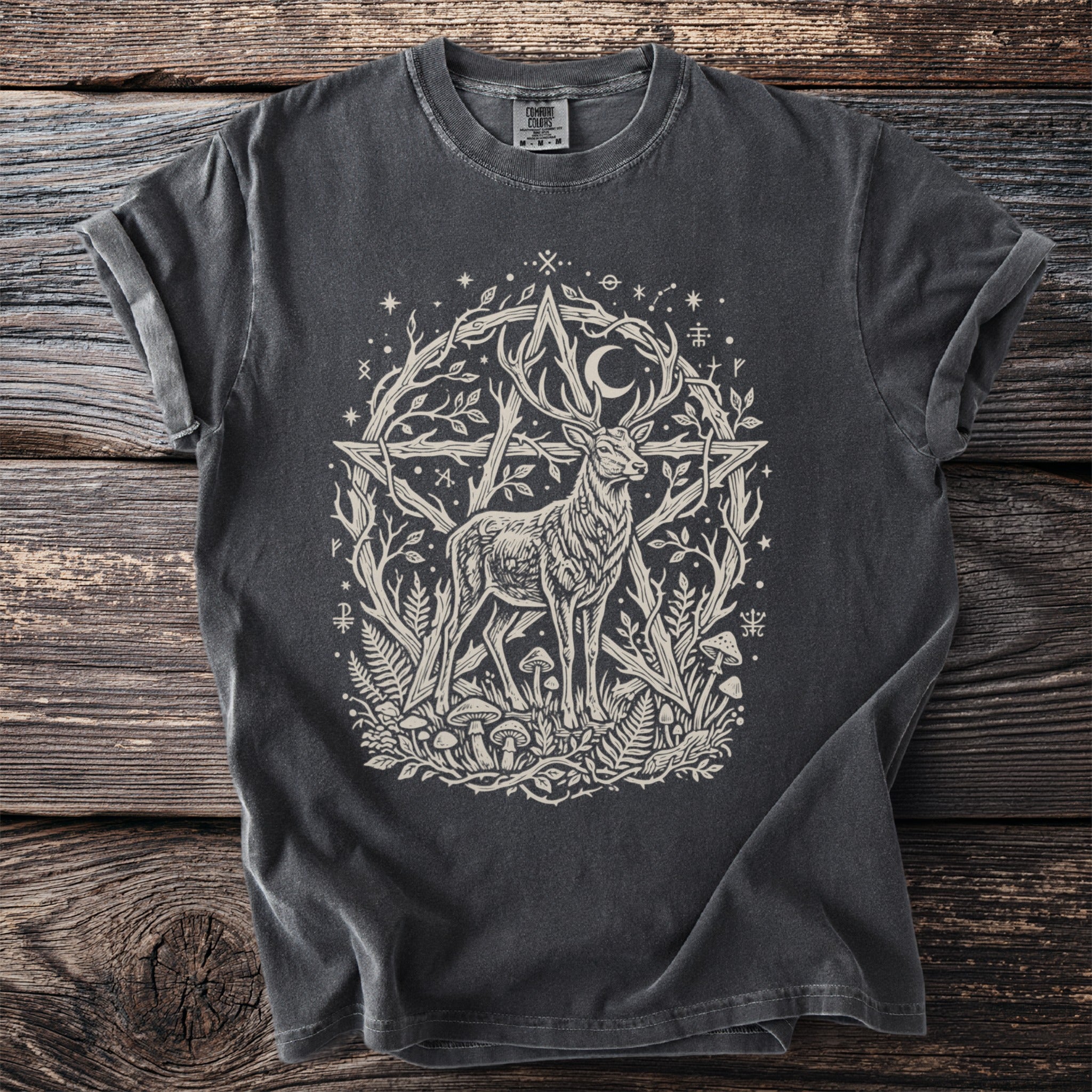 Dark grey t-shirt with a cream colored illustration of a deer within a pentagram.