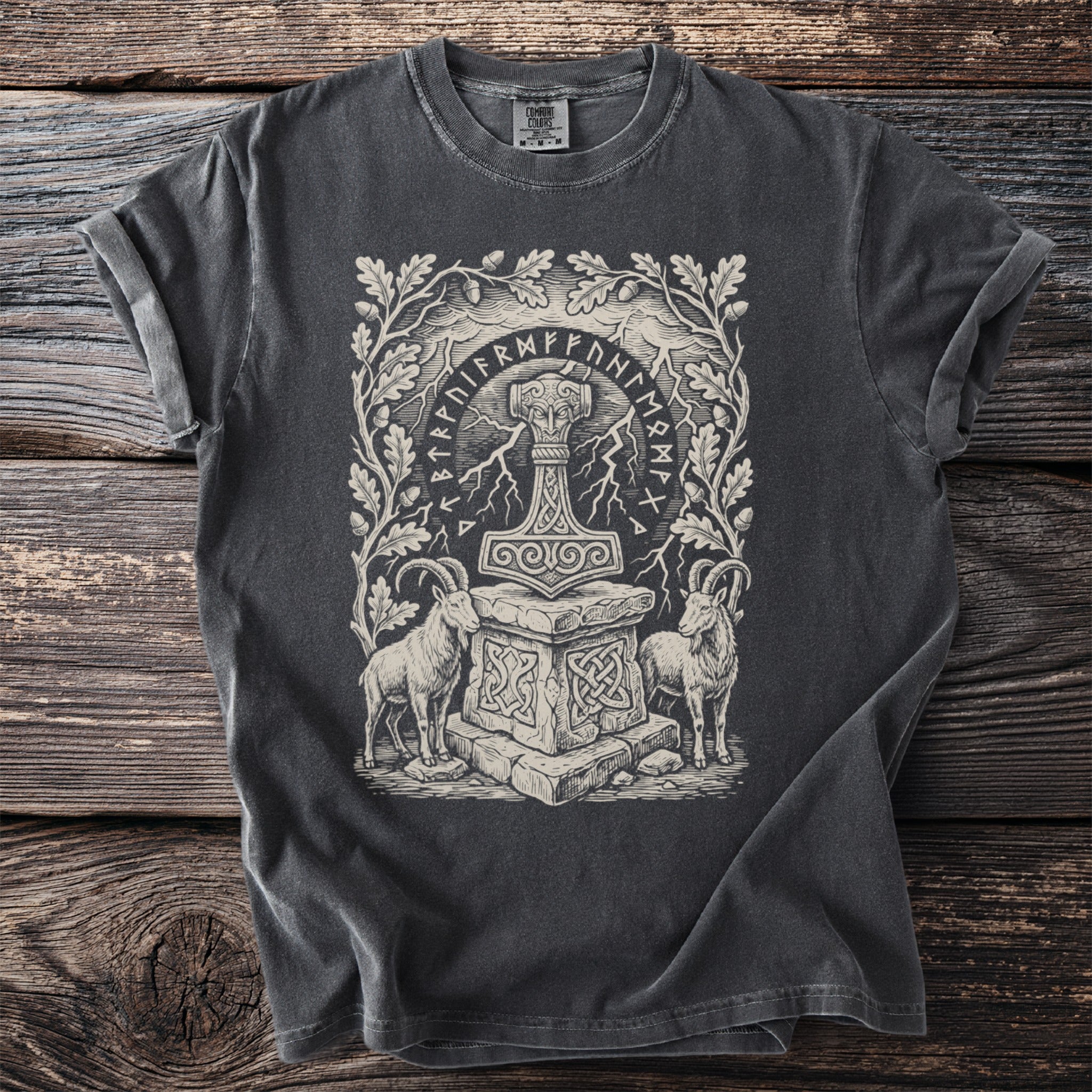 T-shirt with Thor's hammer, goats, oak leaves, and runic inscription.