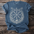 Blue t-shirt with a light-colored circular Norse-inspired print featuring a ship.