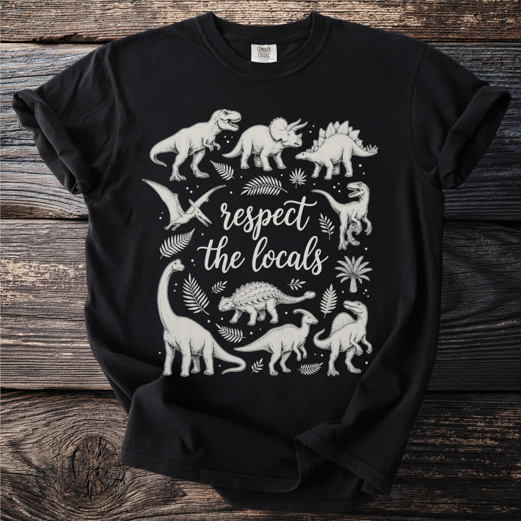 Black t-shirt with dinosaurs and text "respect the locals"