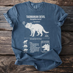 Blue t-shirt with white graphic of a Tasmanian Devil and its biological facts.
