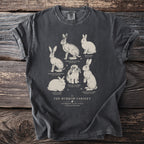 T-shirt featuring an illustration of six rabbit and hare species titled "The Burrow Cabinet."