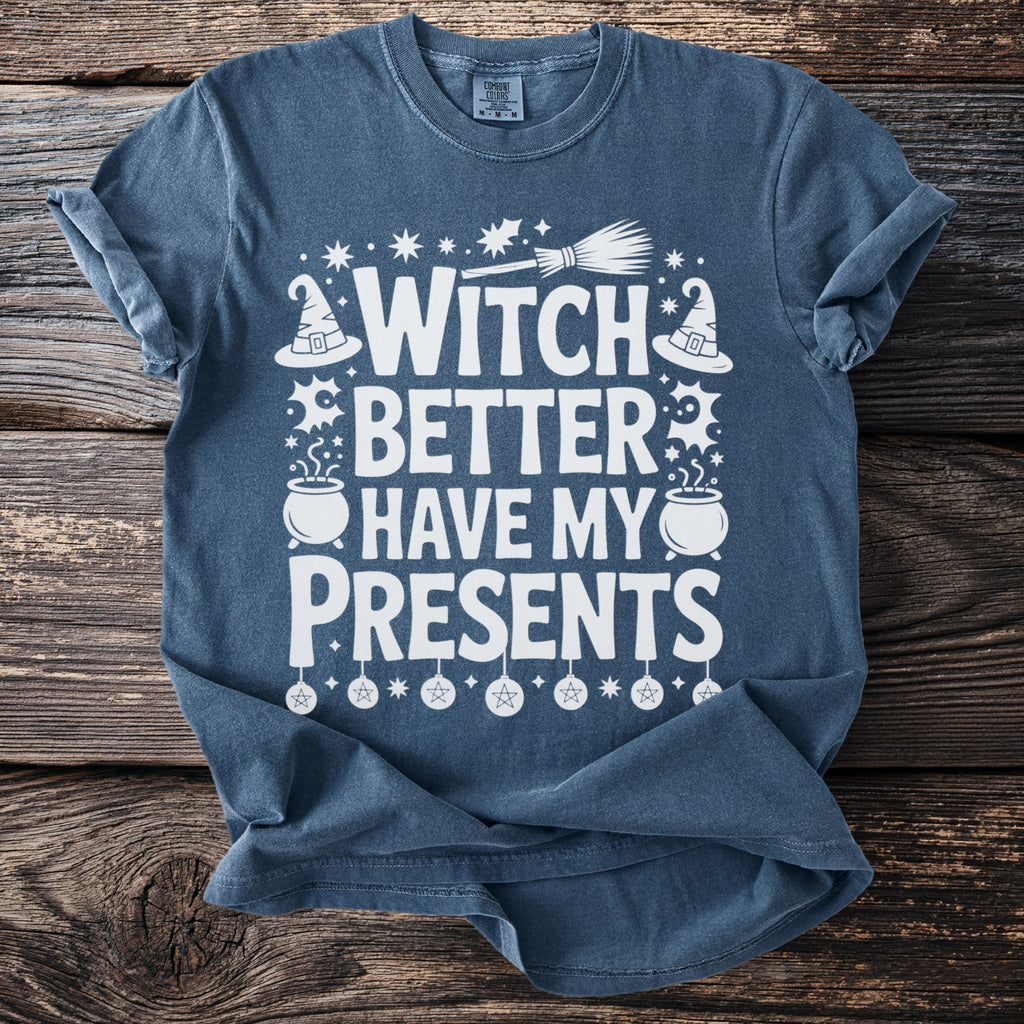 Blue t-shirt with white text reading "WITCH BETTER HAVE MY PRESENTS" and Halloween graphics.