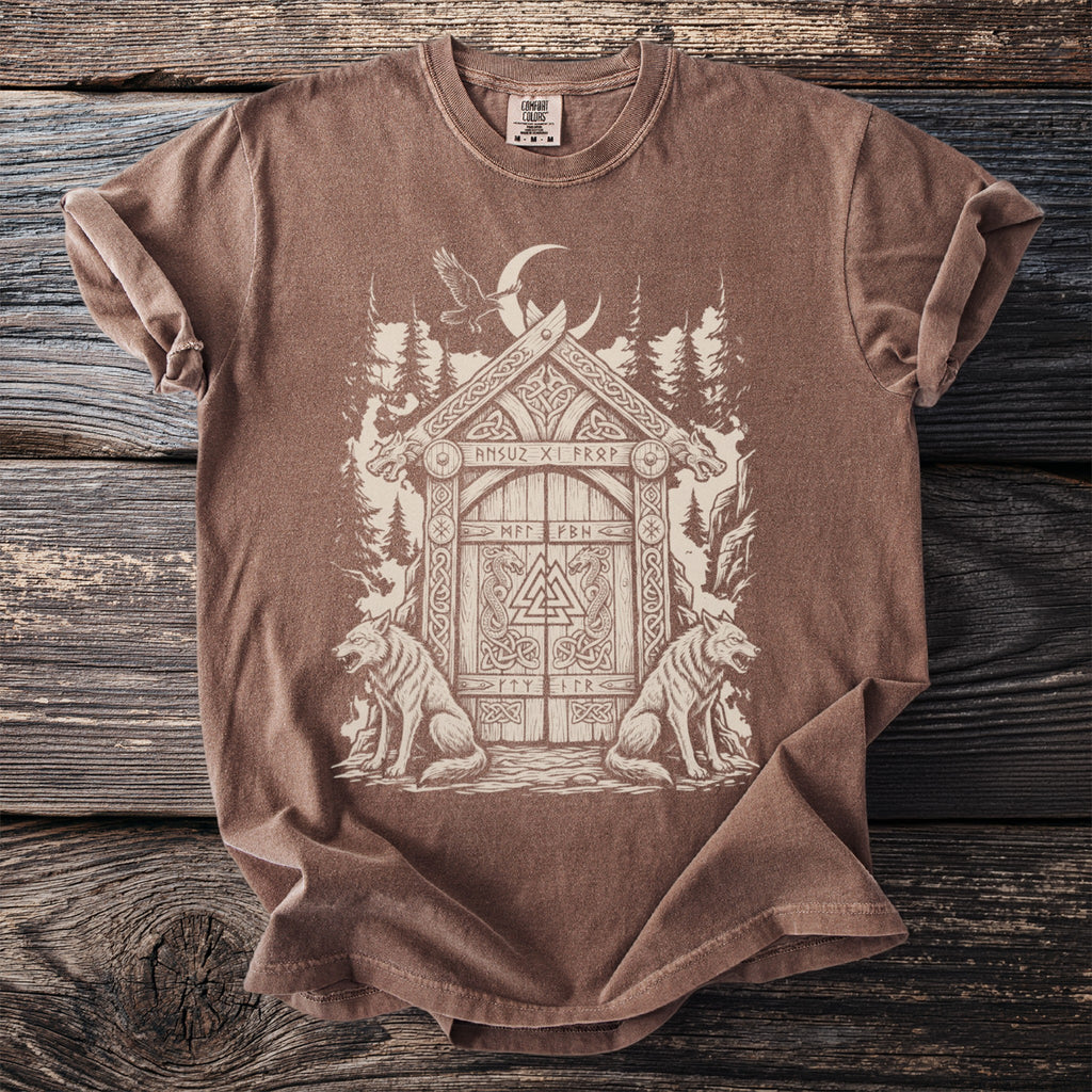 Brown t-shirt with a Norse-inspired graphic of a doorway between two wolves.