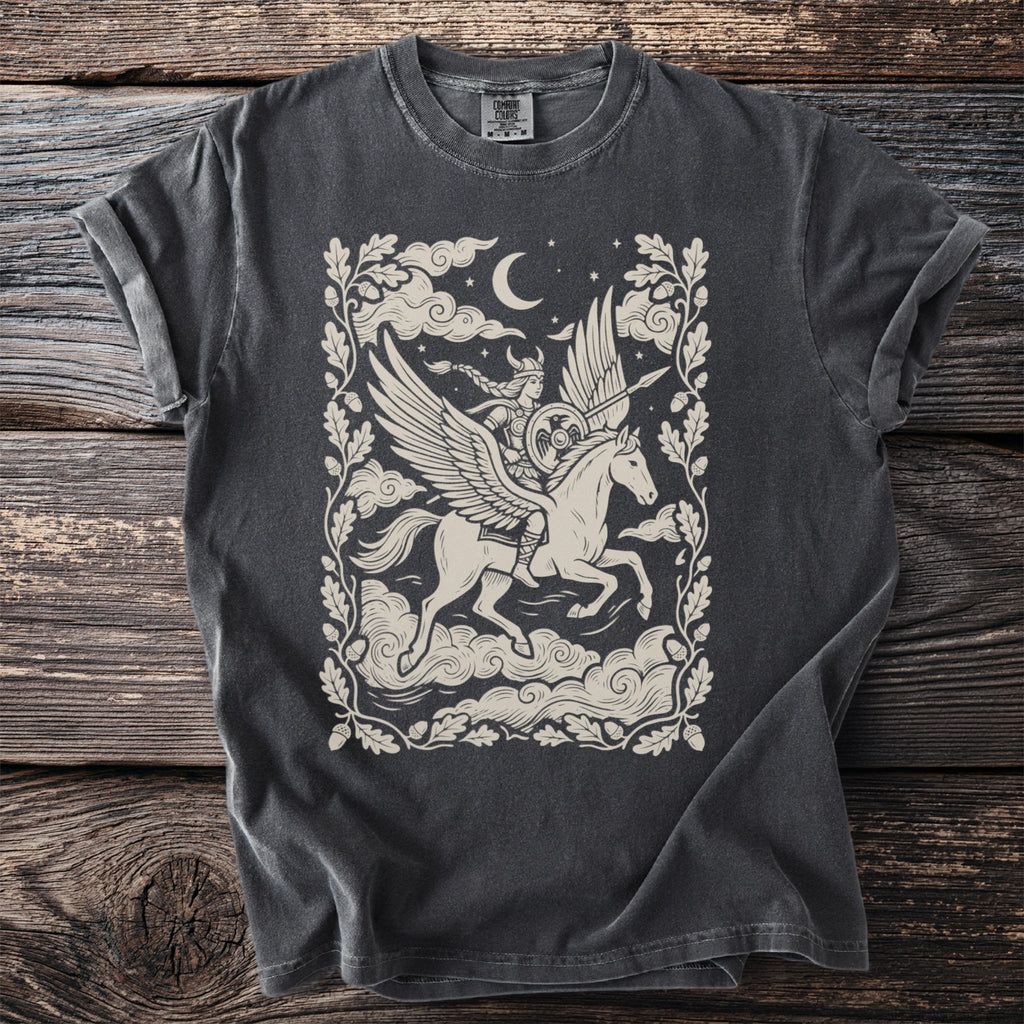 Valkyrie riding a winged horse with a moon and stars, framed by oak leaves.