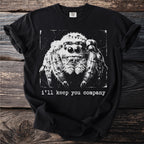 Black t-shirt with a black and white graphic of a jumping spider above the text "i'll keep you company".