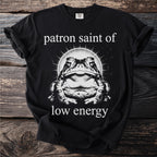 Black t-shirt with a toad graphic and text saying "patron saint of low energy".
