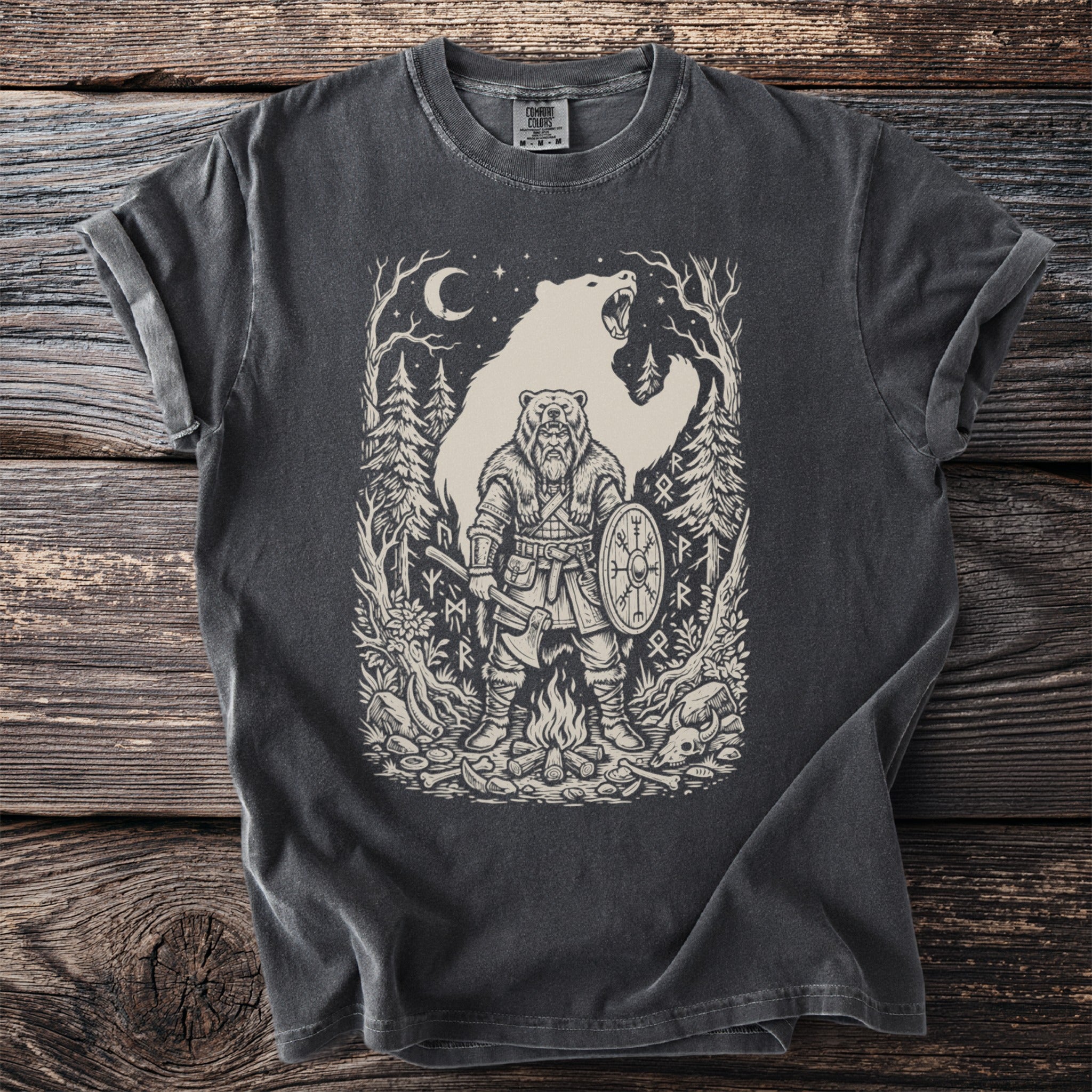 Dark t-shirt featuring a Viking warrior with a bear behind him.
