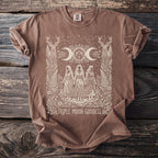 Brown t-shirt with a white graphic of the Triple Moon Goddess and deer.