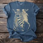 Blue t-shirt with a tan zebra head graphic and a comfort colors tag.