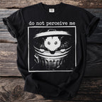 Black t-shirt with a white graphic of an opossum in a trash can reading "do not perceive me."