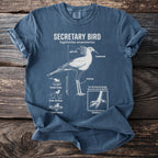 Secretary Bird anatomical diagram on a blue t-shirt, including quill crest, long legs, and feet.