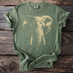Green t-shirt with a faded graphic of an elephant's head and tusks.