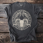 Dark t-shirt featuring a circular design with two ravens over a ram skull and runes.