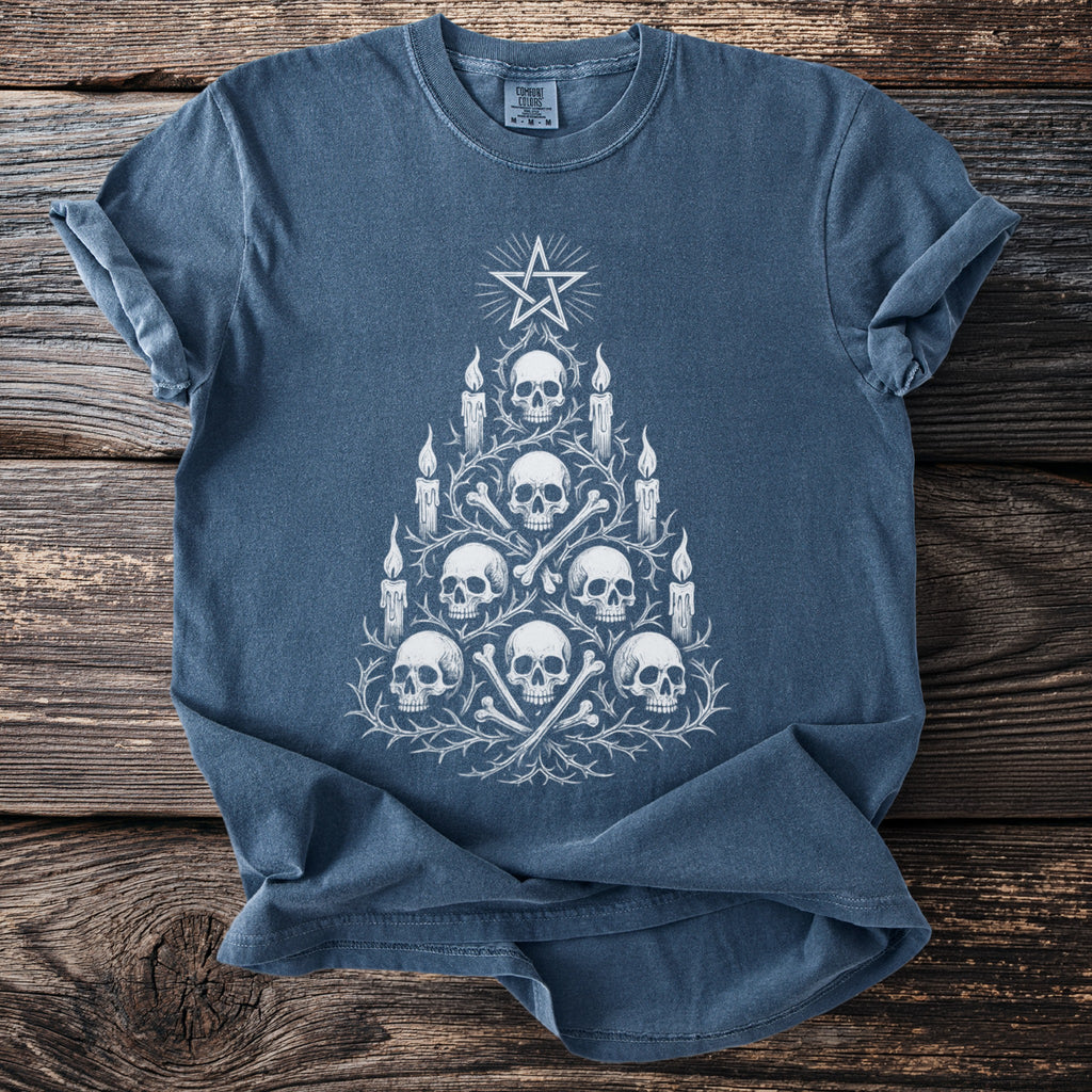 Blue t-shirt with a white skull and bones Christmas tree design and a star.