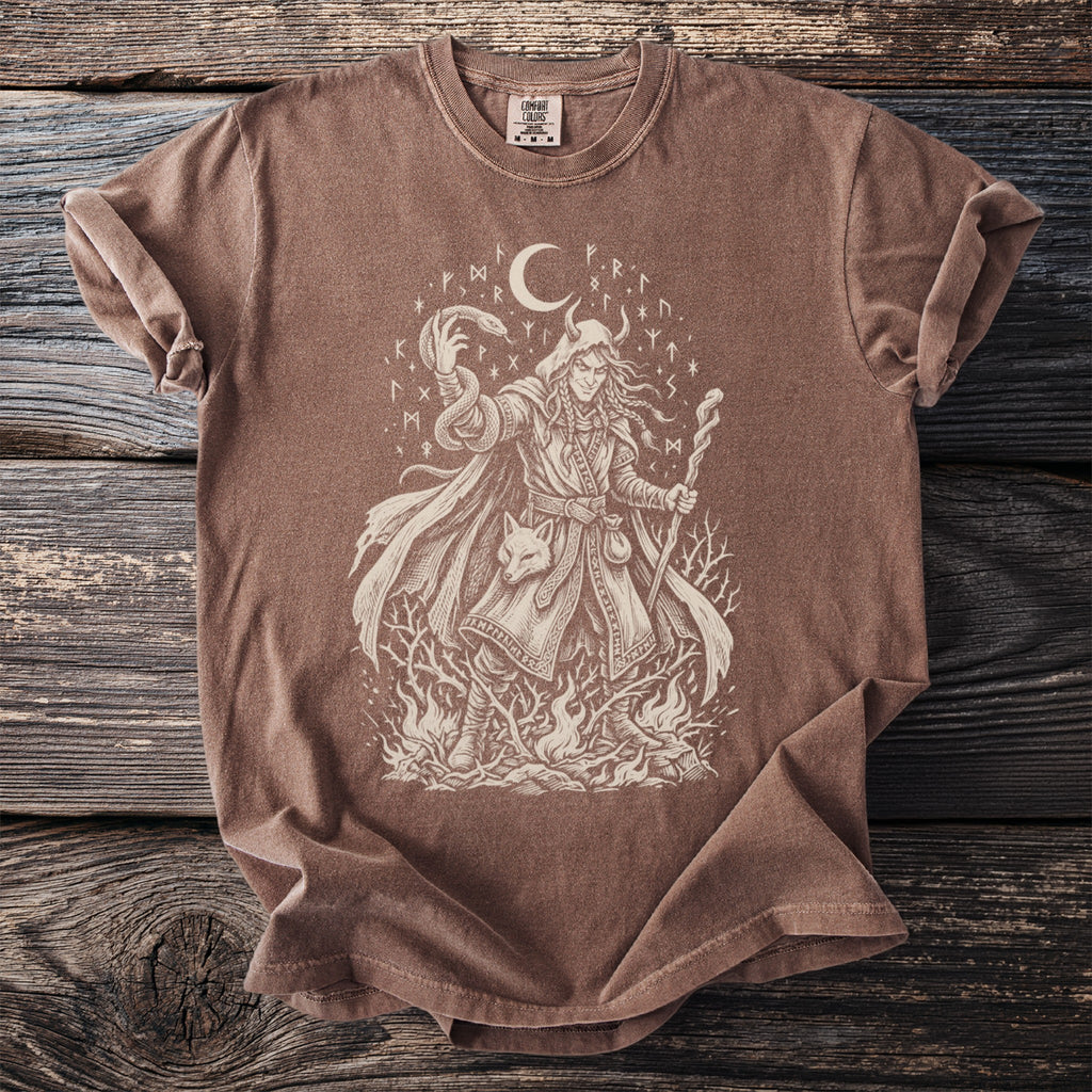Brown t-shirt with a pagan graphic of a woman with a snake and fox on a wooden background.