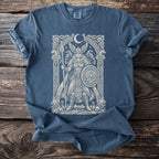 Blue t-shirt with a Viking design featuring a winged warrior, ravens, and runes.
