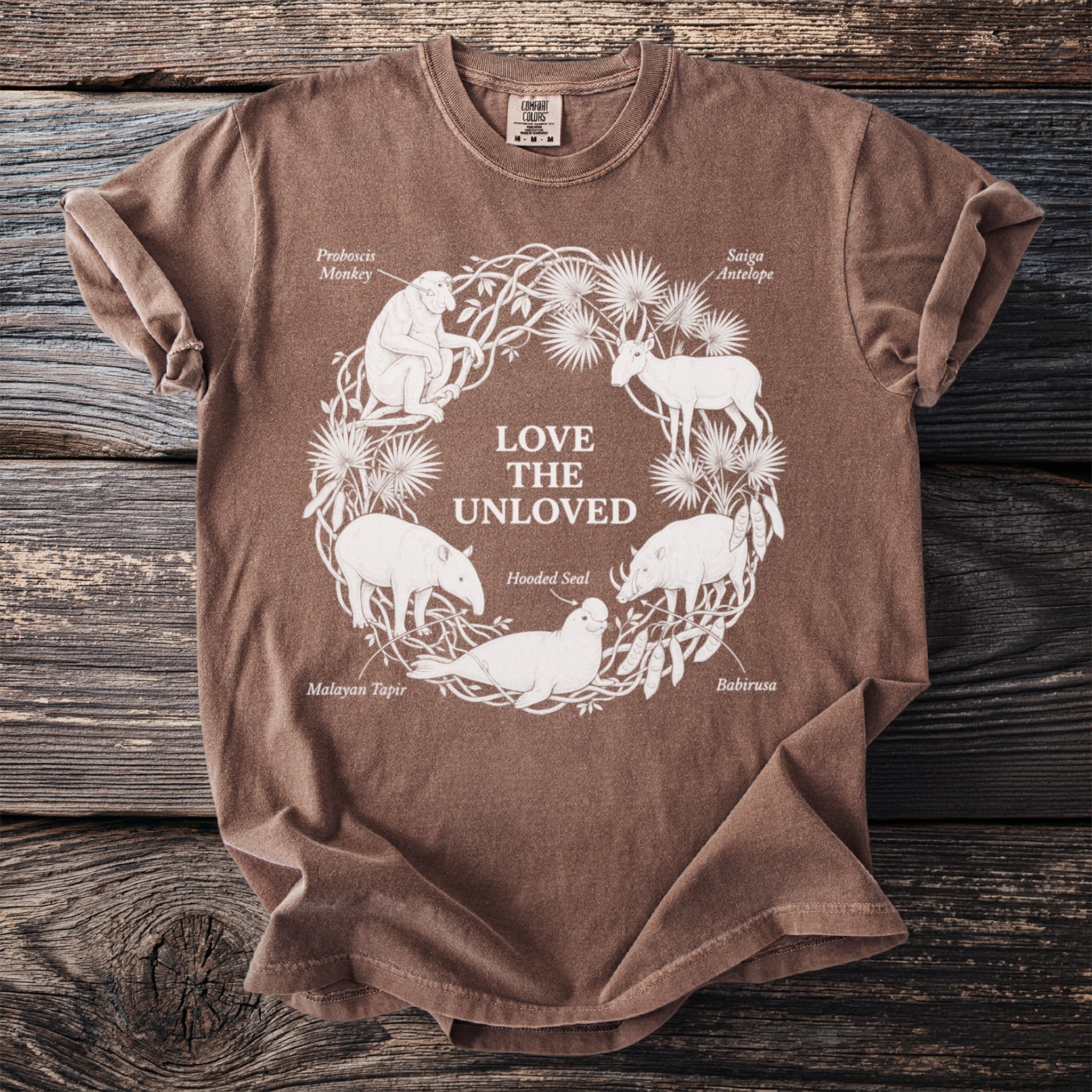 Brown shirt with "Love the Unloved" graphic featuring endangered animals in a circle.
