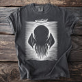 Dark t-shirt with a white graphic of a tentacled creature and a rowboat.
