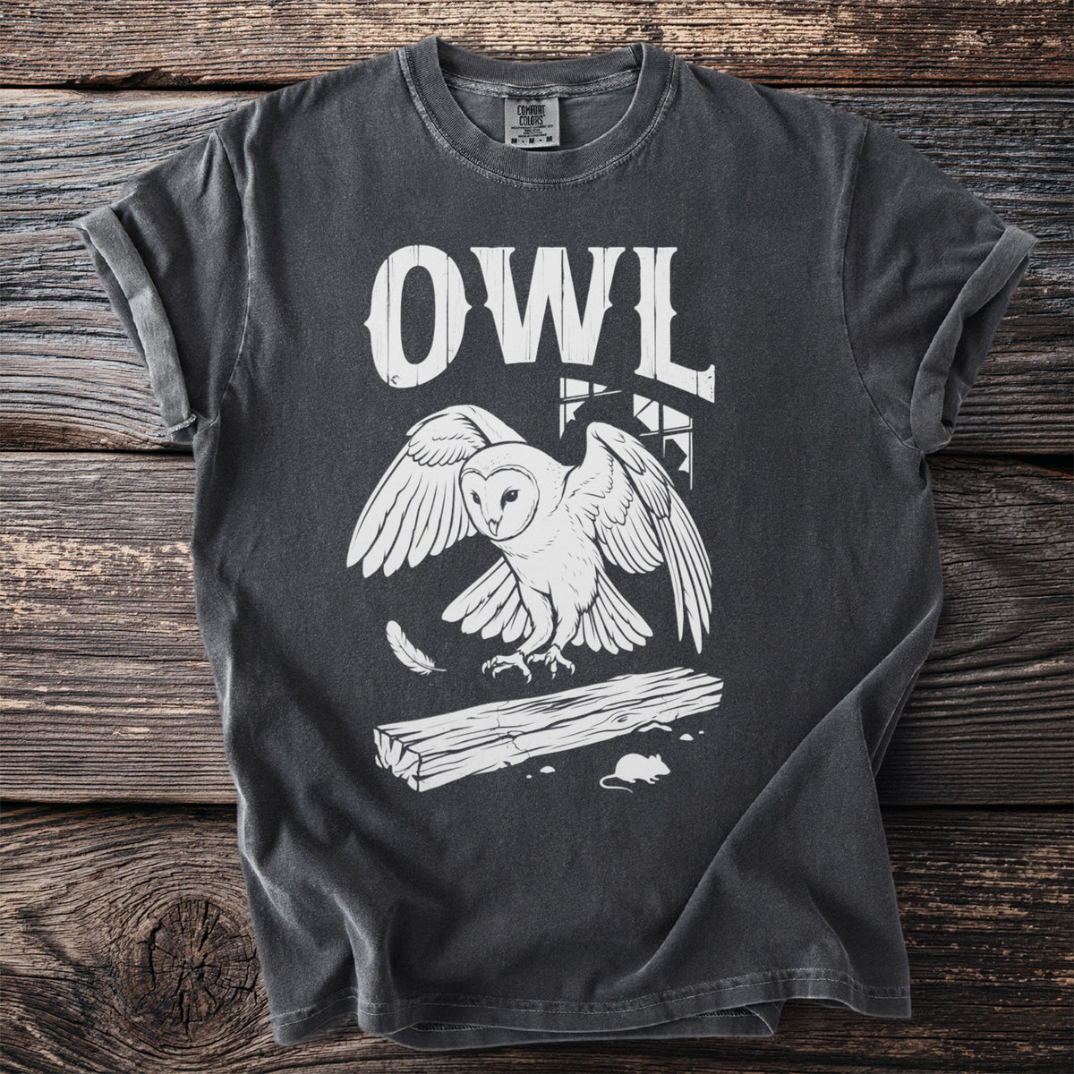 Dark grey t-shirt with white "OWL" text and barn owl graphic.