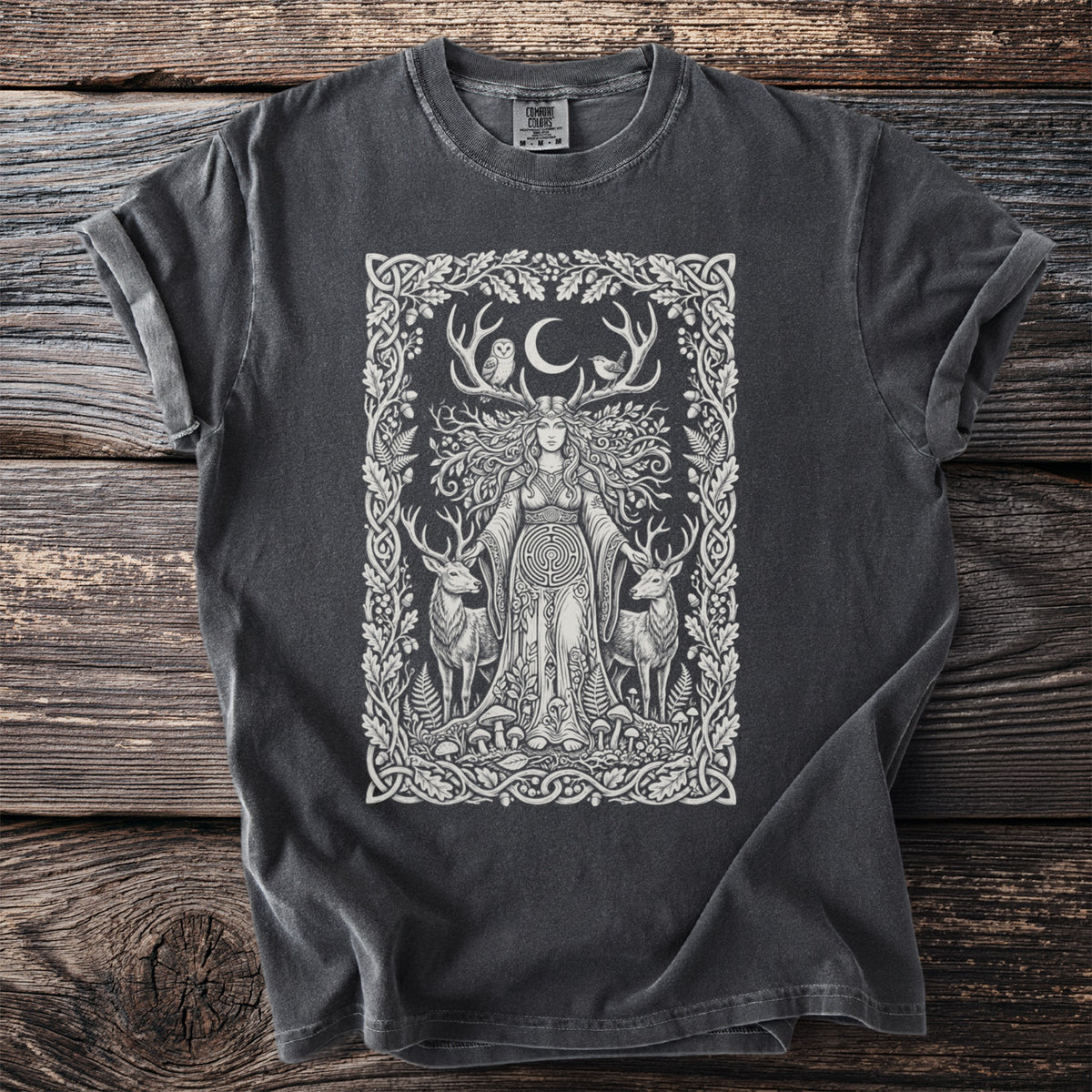 Dark gray t-shirt with a white pagan nature goddess print and celtic knot border.