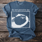 T-shirt with white text "do not perceive me" over a cat in a sink.