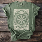 Green t-shirt with Helm of Awe Norse symbol, Viking helmet, axes, and runes.
