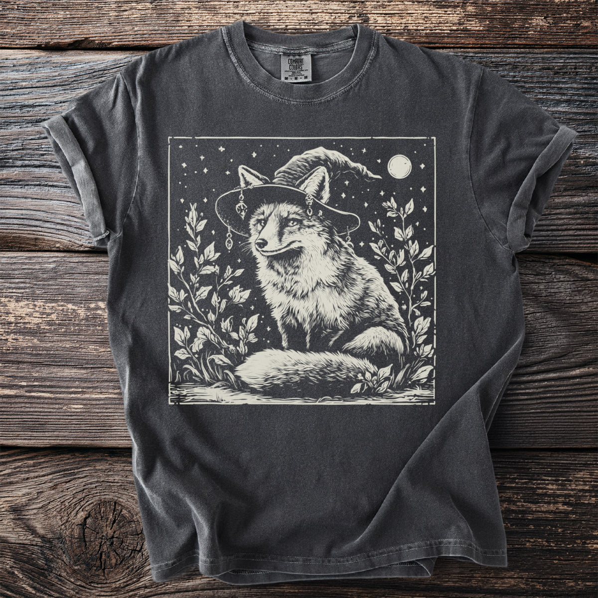T-shirt with a vintage-style graphic of a fox wearing a witch hat.