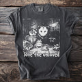Dark t-shirt with black and white graphic of various creatures and "love the unloved" text.