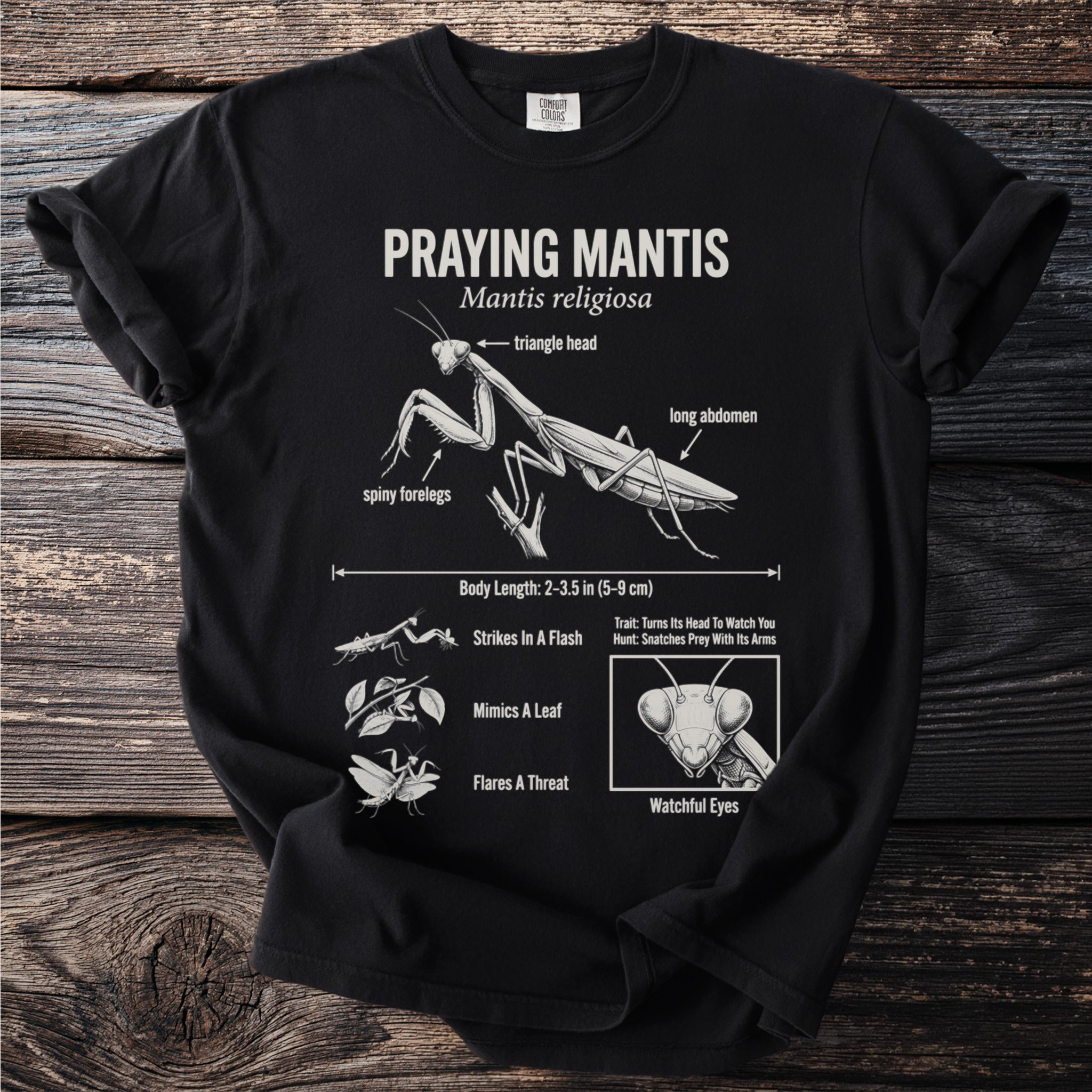 Black t-shirt withPraying Mantis diagram detailing head, body, and behaviors.