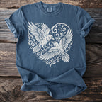 Blue t-shirt with white heart design featuring two ravens and floral elements.
