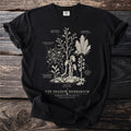 Black t-shirt with botanical illustrations of parasitic plants labeled "The Shadow Herbarium."